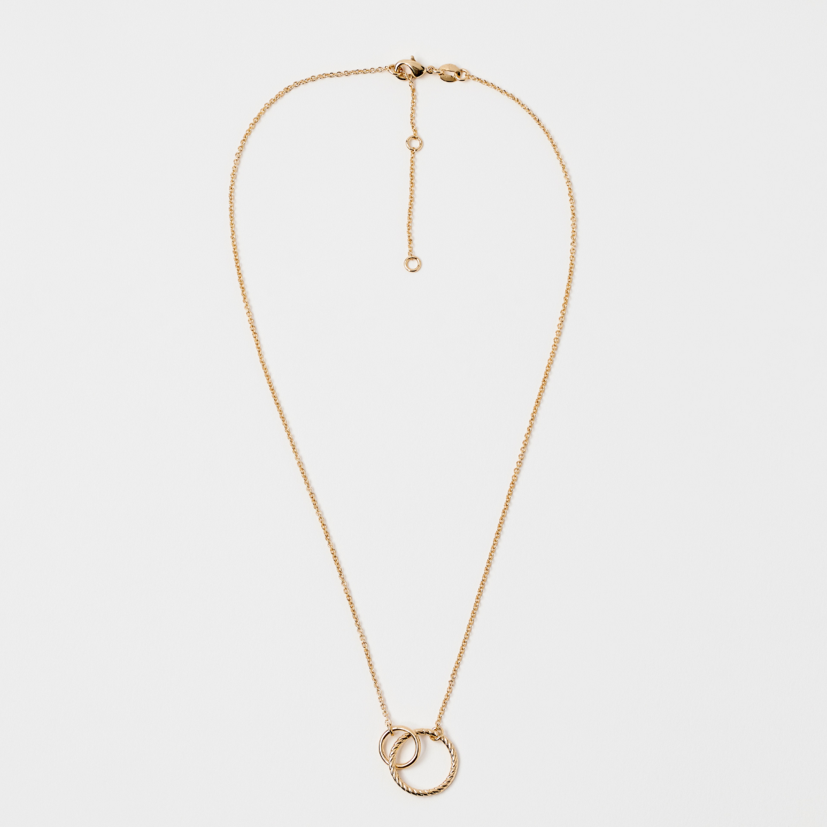 Collier duo d'anneaux lisse et strié plaqué or
