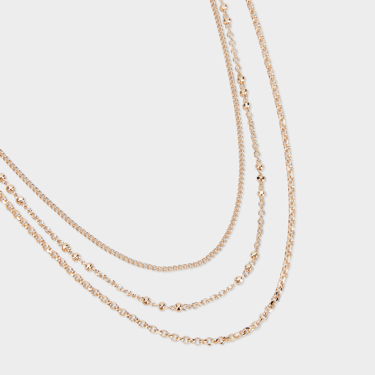 Collier trio de chaînes plaqué or