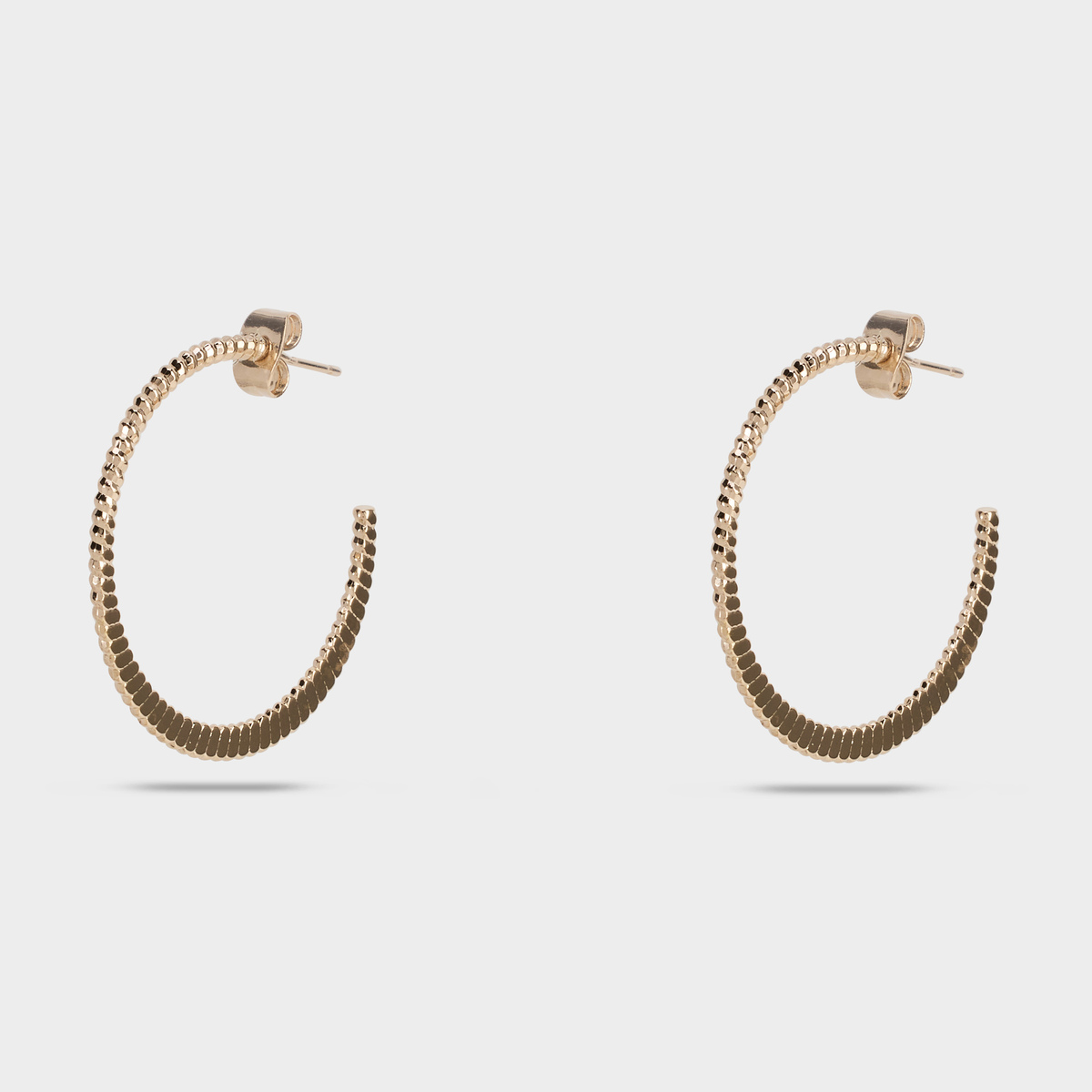Boucles d'oreilles créoles ciselées plaqué or