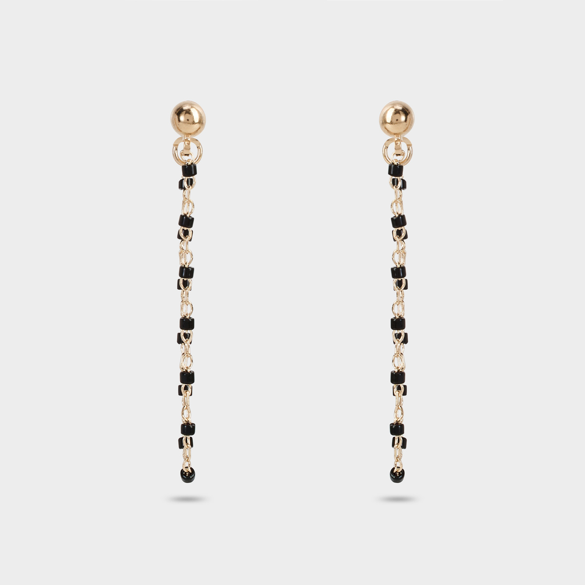 Boucles d'oreilles Mahos devant derrière noires plaqué or