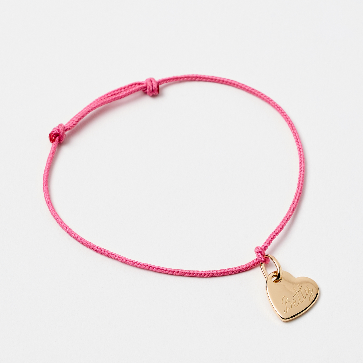 Bracelet 1 mini breloque mini cœur sur lien coton fin plaqué or