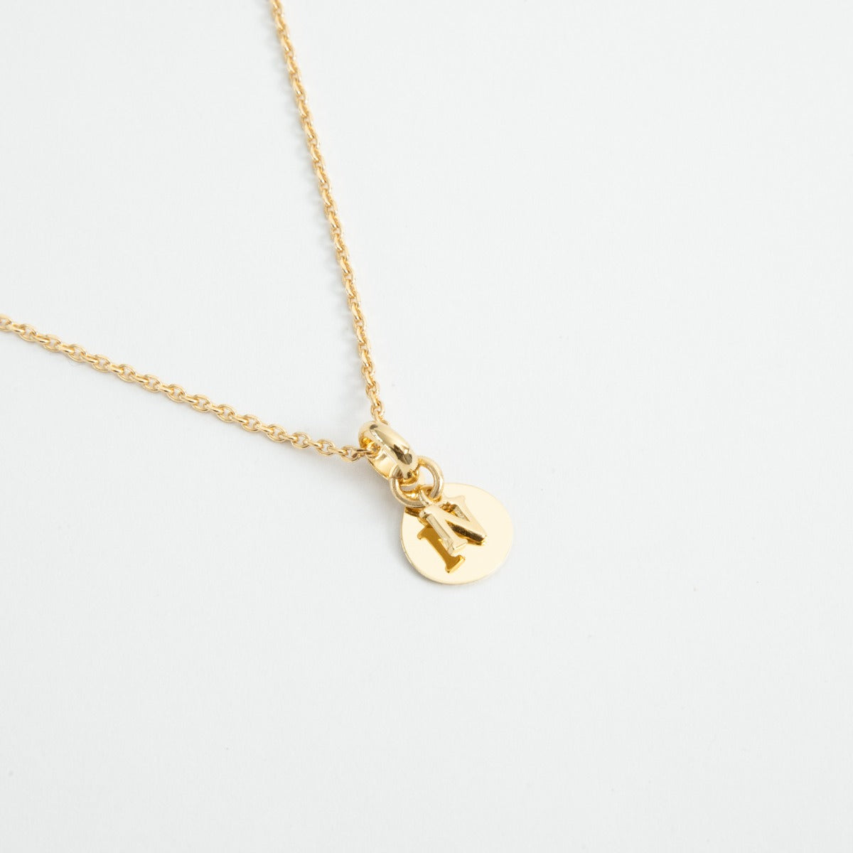 Collier lettre et mini rond plaqué or