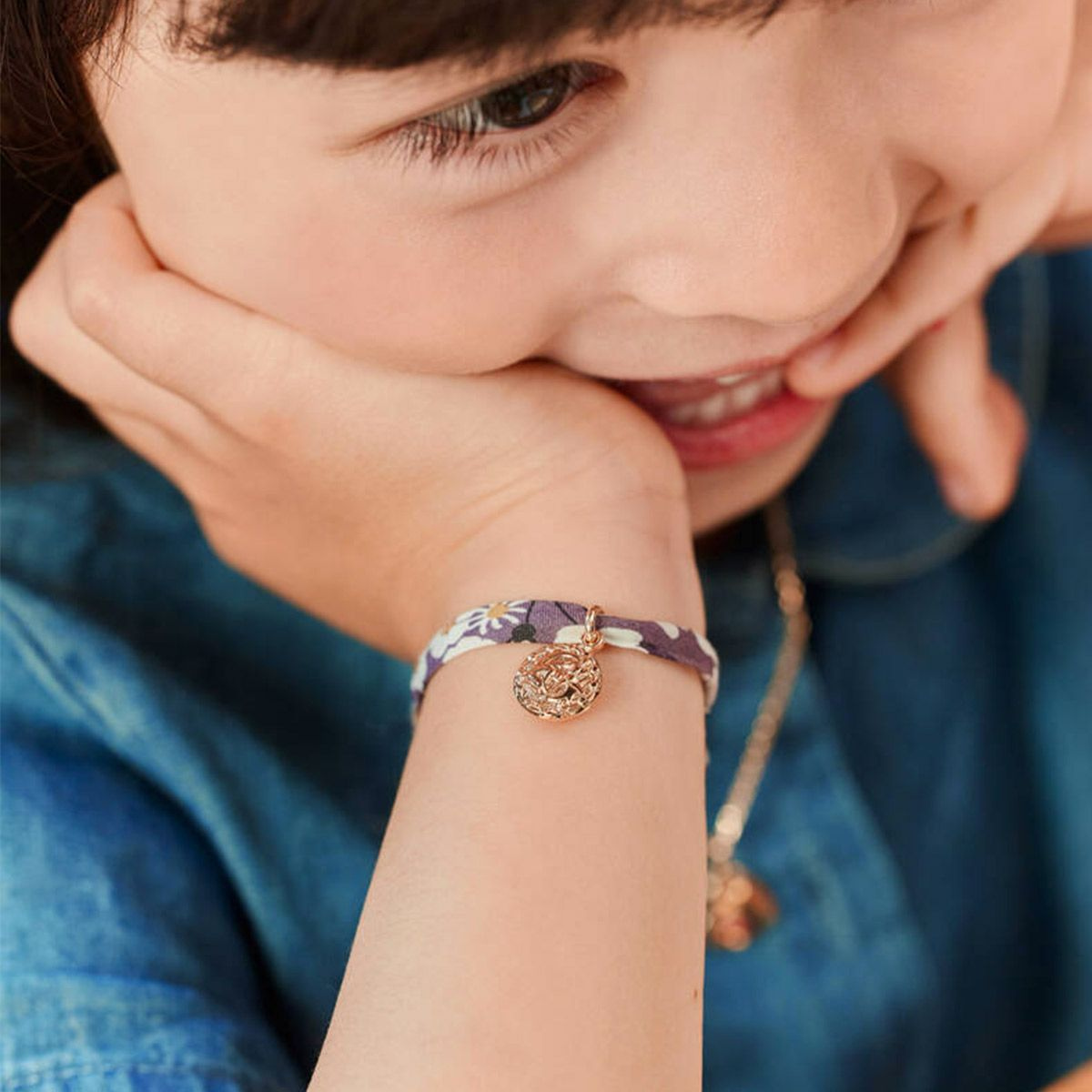 Bracelet mini zodiaque plaqué or sur cordon liberty