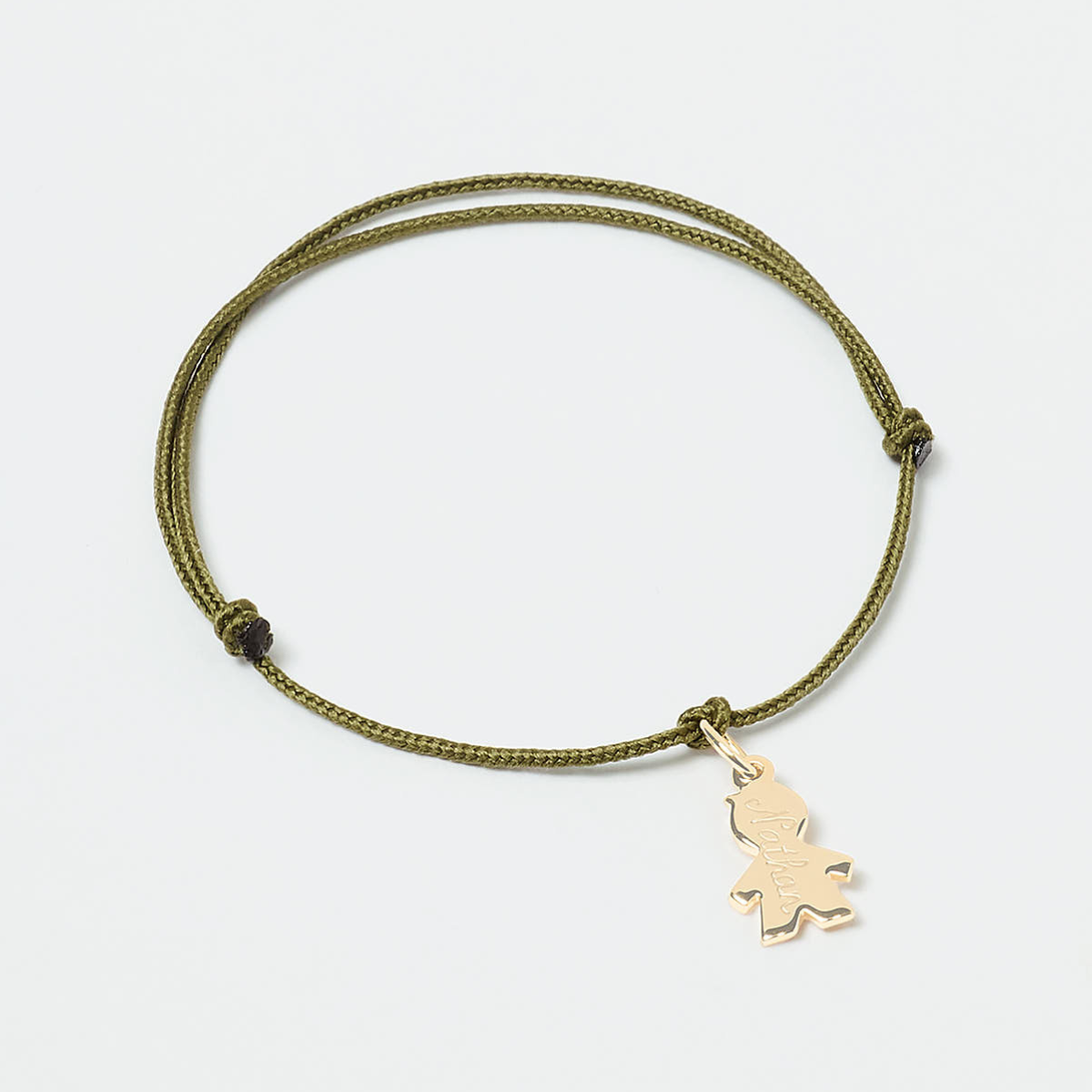 Bracelet 1 mini breloque mini garçon sans pieds sur lien coton fin plaqué or