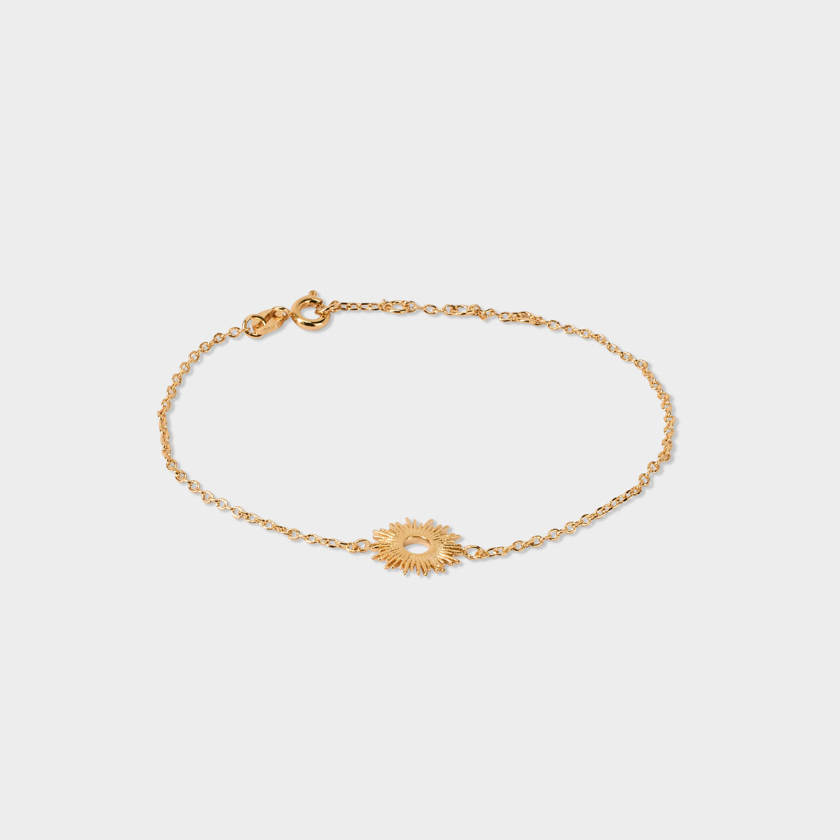 Bracelet soleil sur chaîne plaqué or