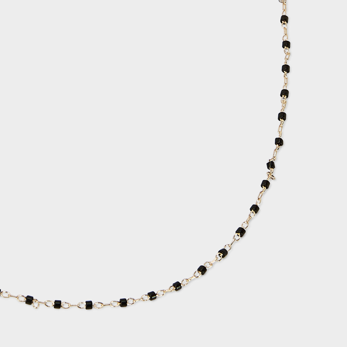 Collier Mahos plaqué or noir