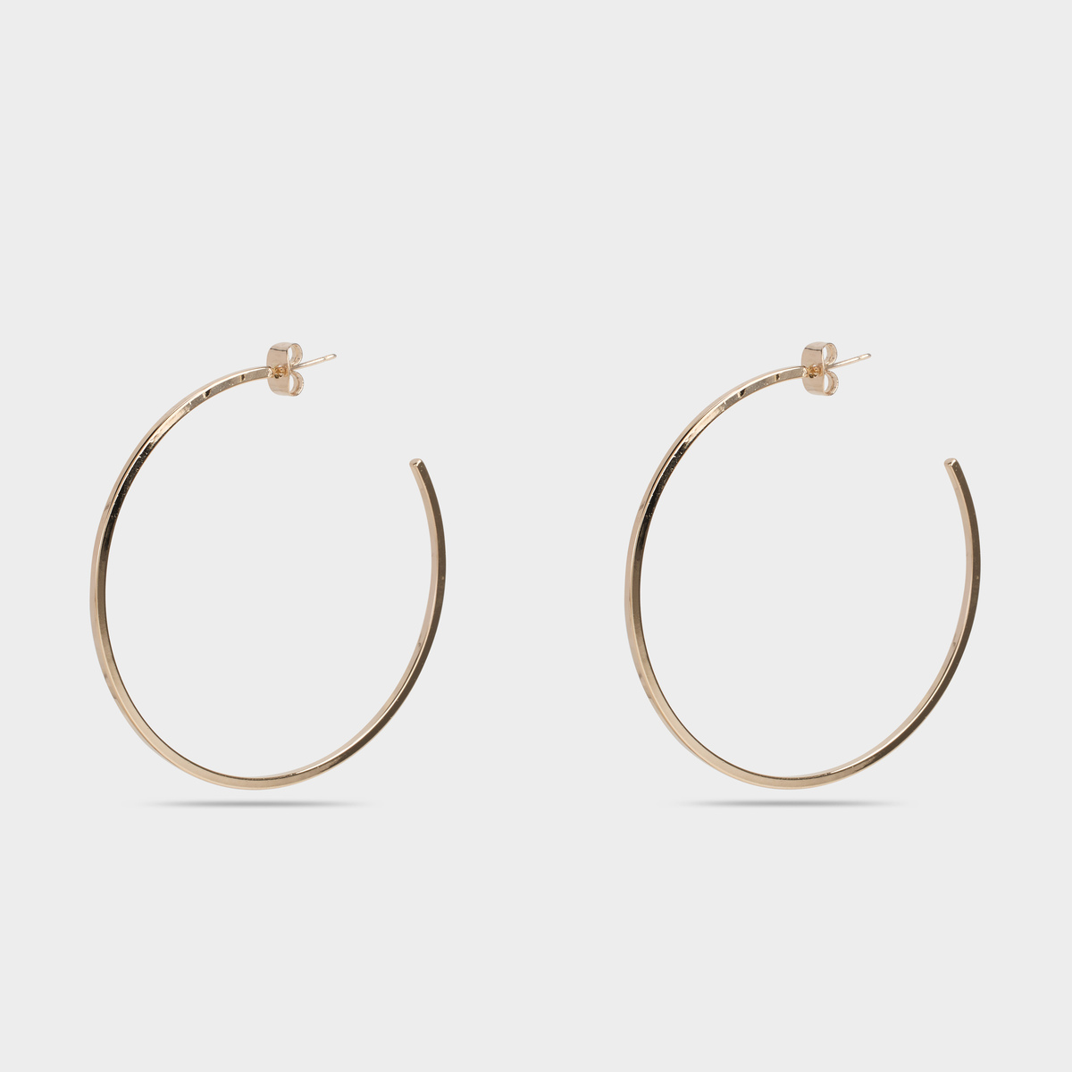 Boucles d'oreilles créoles lisses plaqué or
