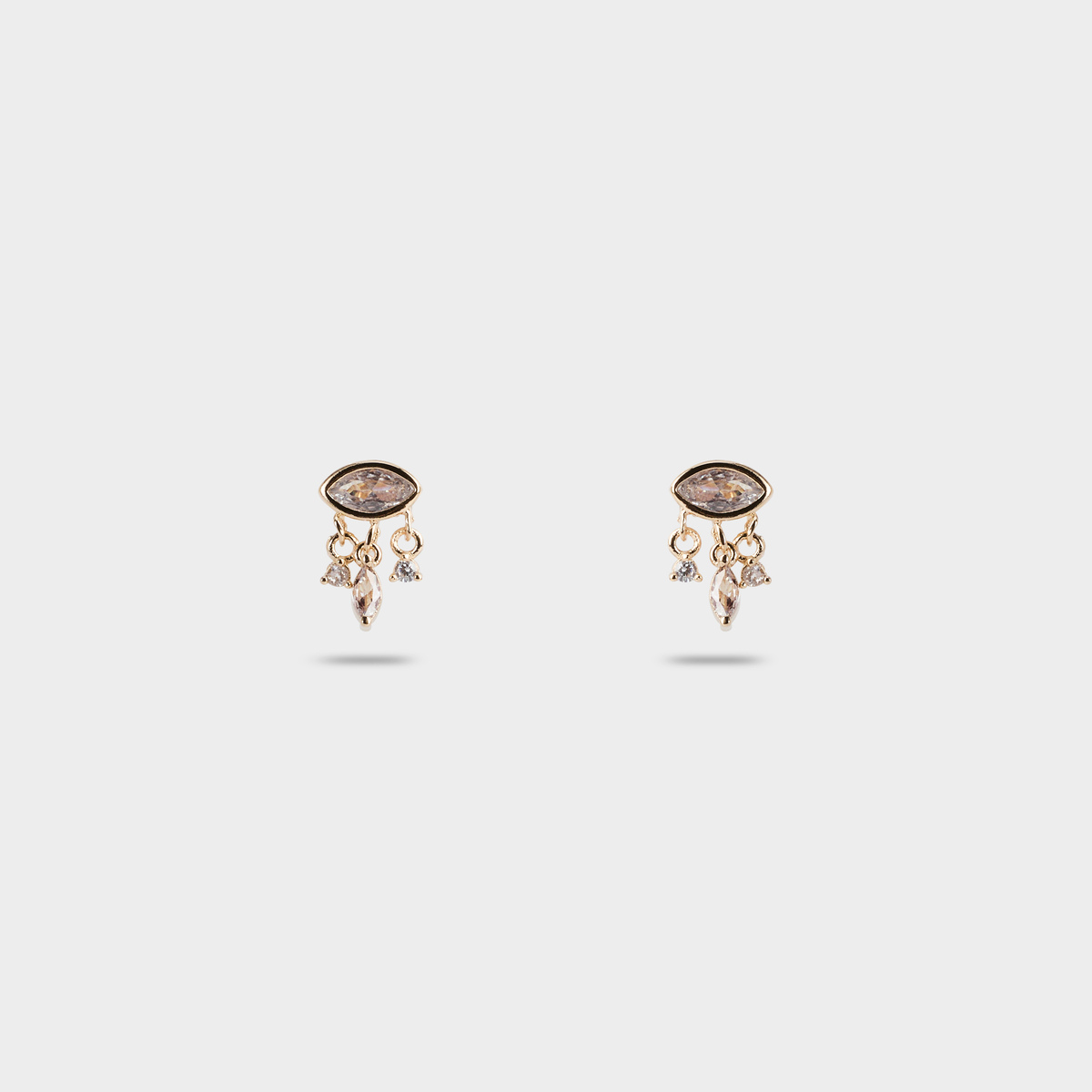 Boucles d'oreilles navette pendants zircons plaqué or