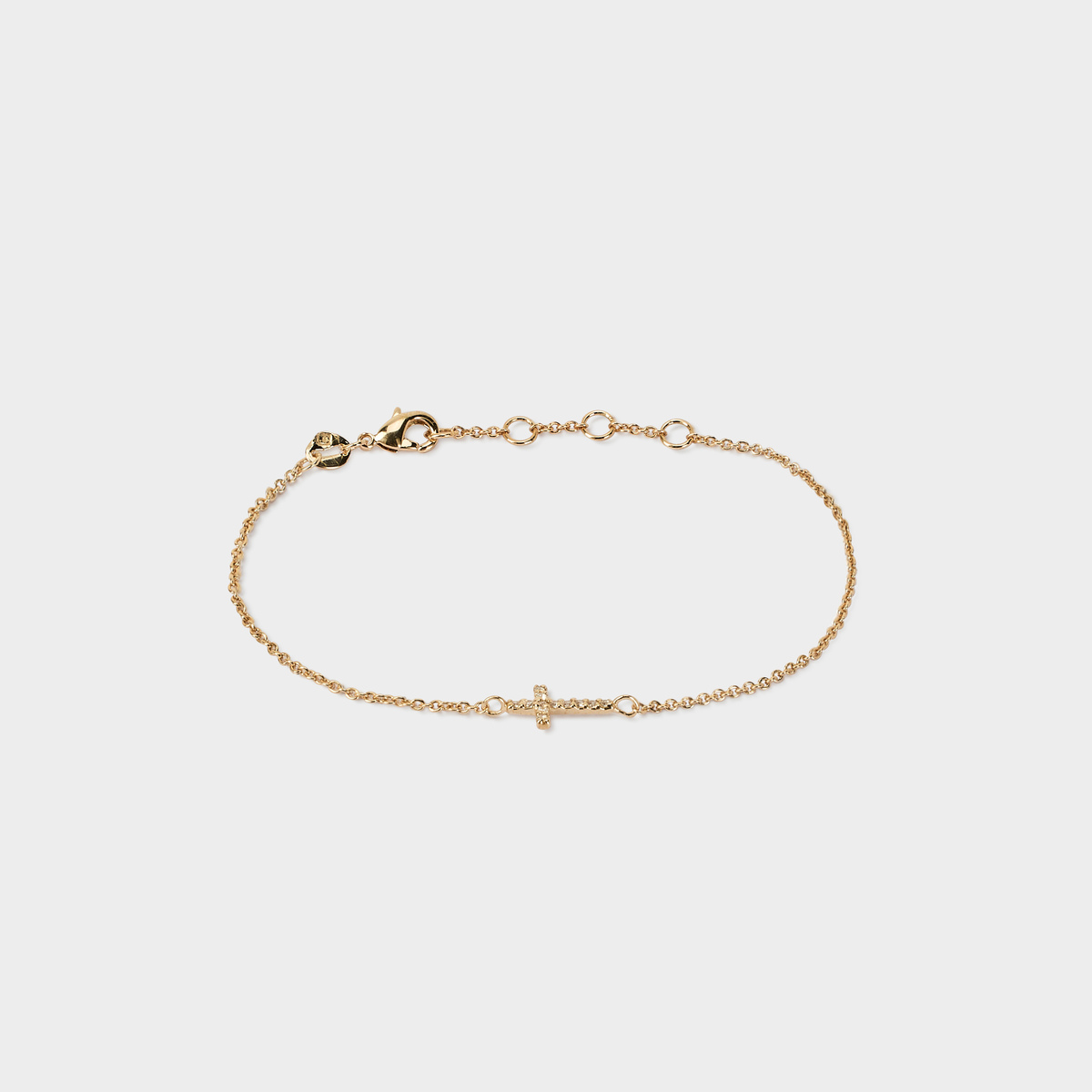Bracelet croix pavée horizontale sur chaîne plaqué or