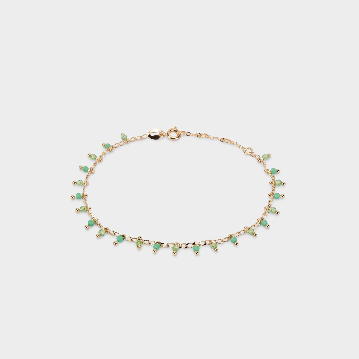 Bracelet pampilles facettées vertes plaqué or