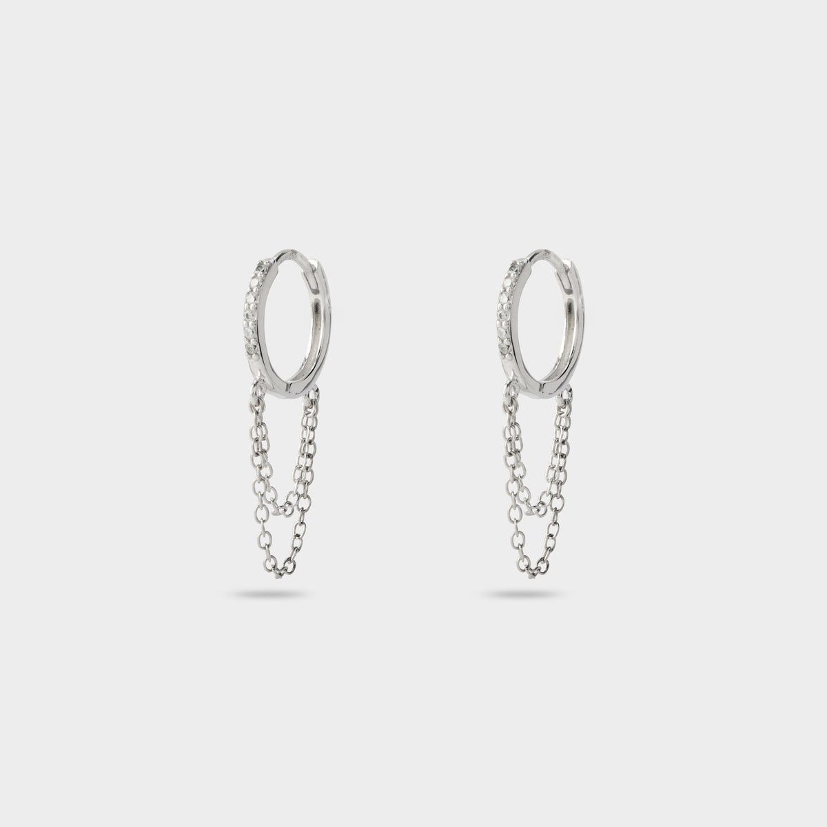 Boucles d'oreilles créoles pavées Eclat sur chaîne argent