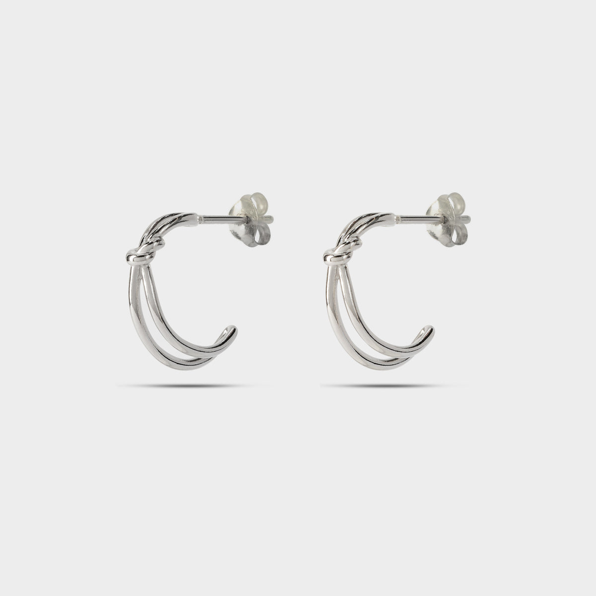 Boucles d'oreilles créoles nœud argent