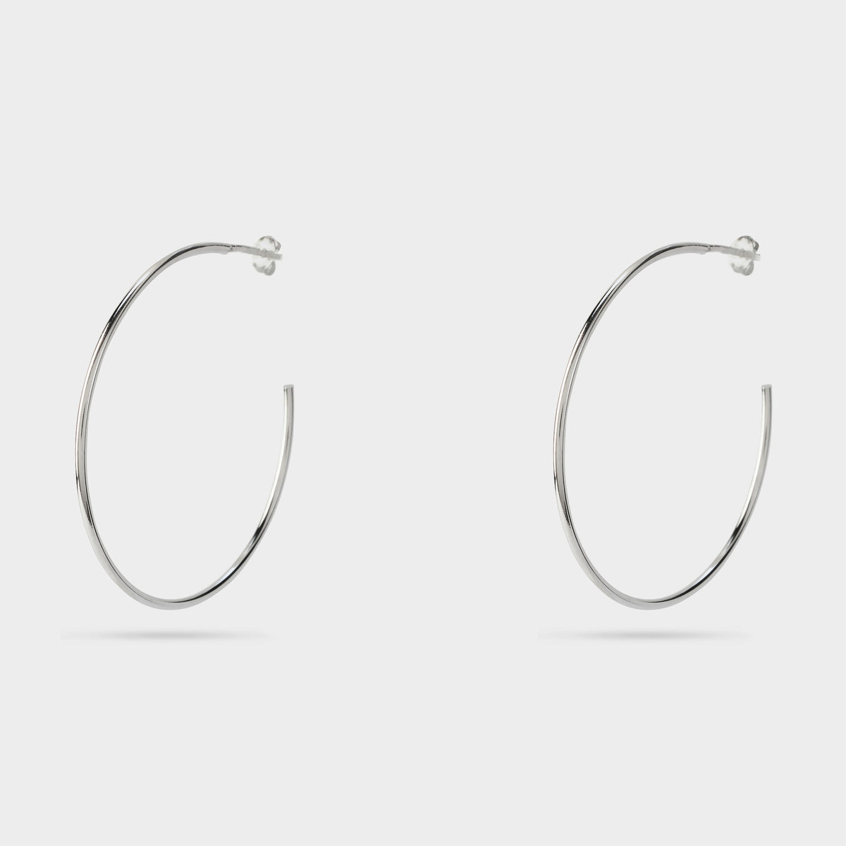 Boucles d'oreilles moyennes créoles tube argent