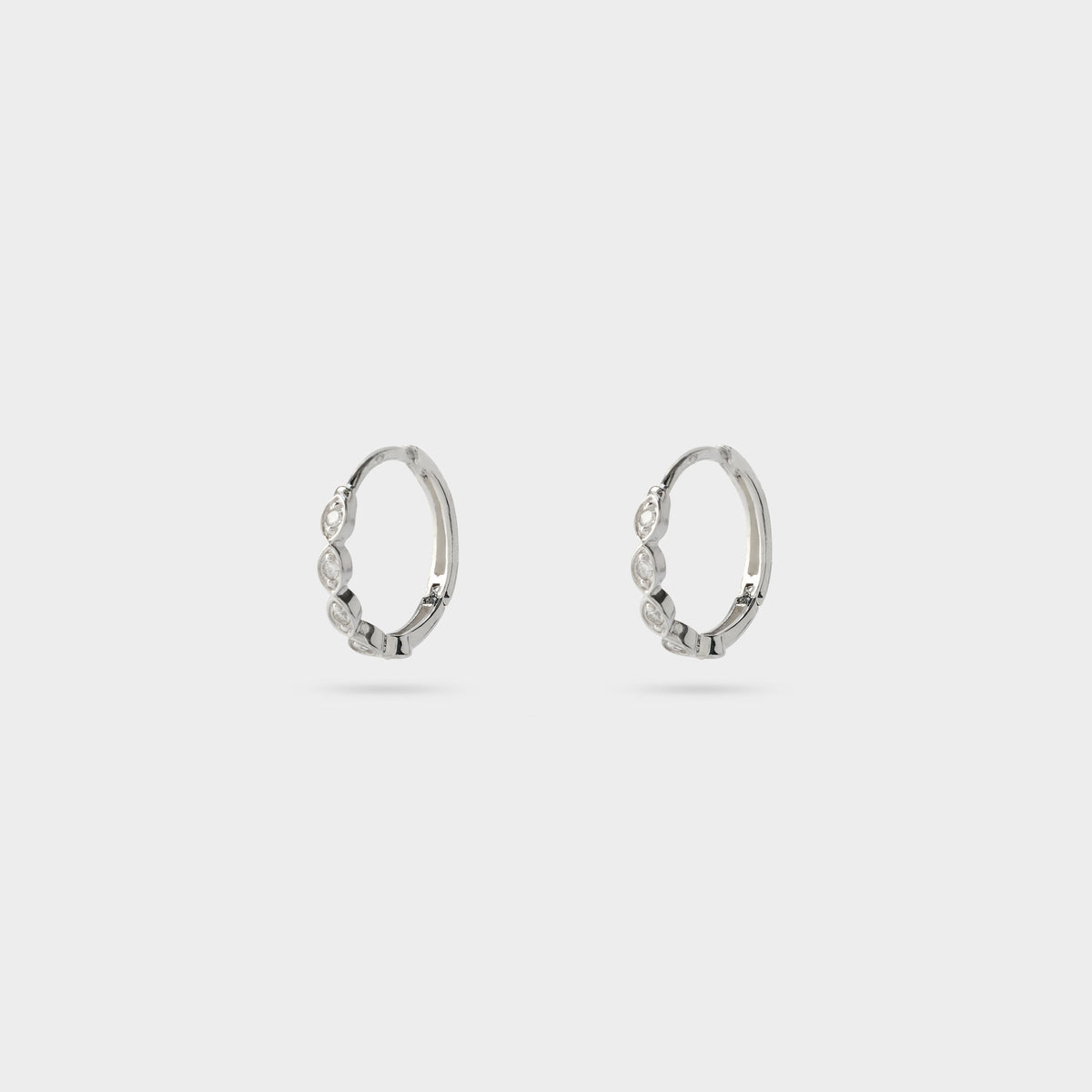 Boucles d'oreilles mini créoles couronne navette argent