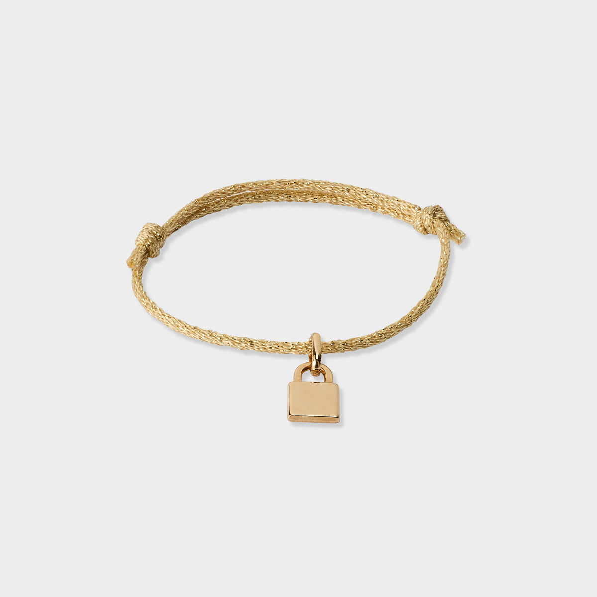 Bracelet gris-gris sur cordon pailleté doré plaqué or