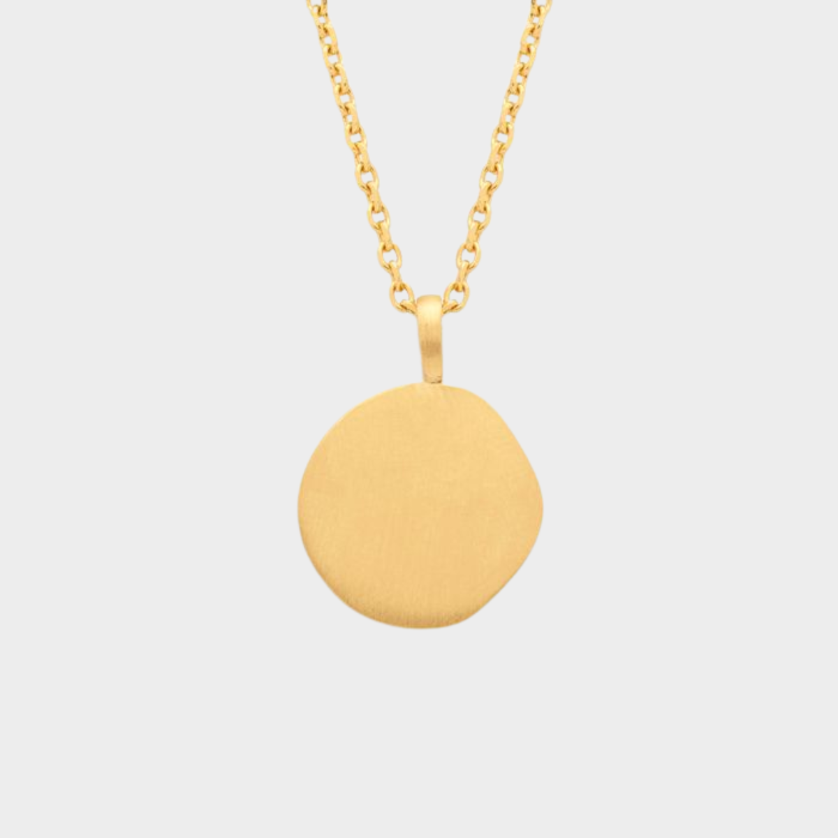 Collier médaille nude sur chaîne maille forçat