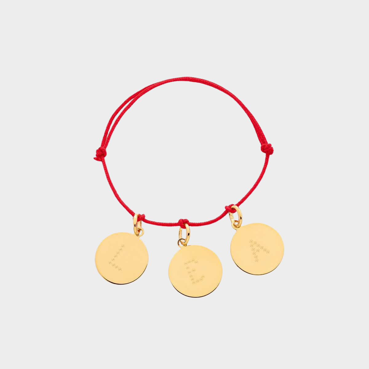 Bracelet petite médaille lettre gravure étoilée plaqué or