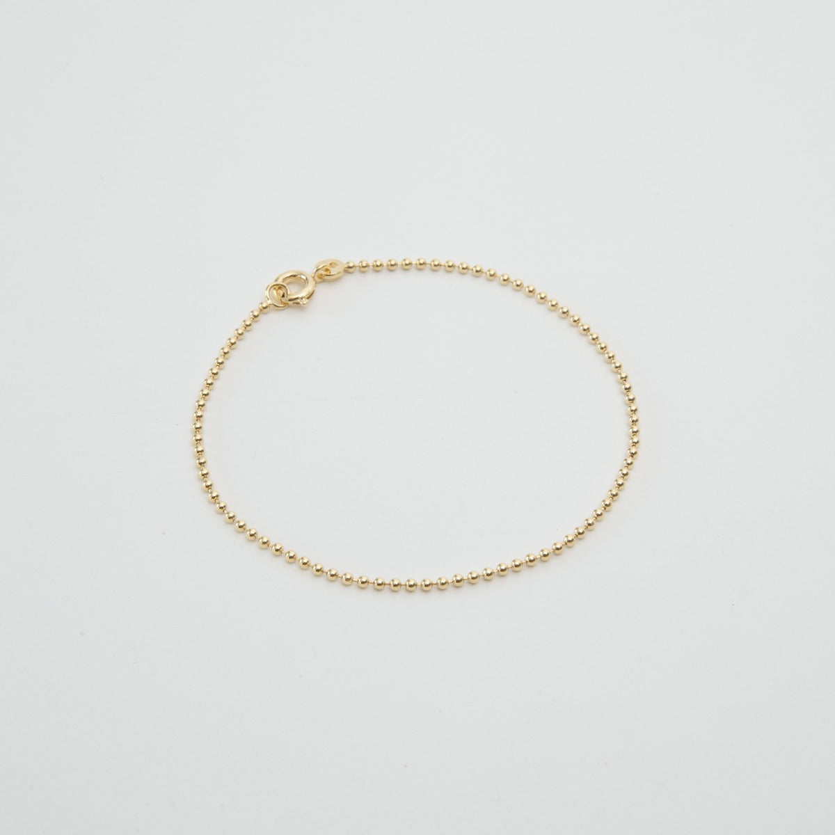 Bracelet chaîne petites billes plaqué Or