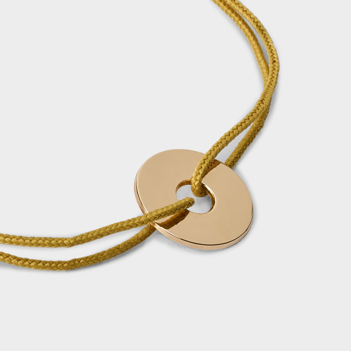 Bracelet petite cible plaqué or sur lien coton_2