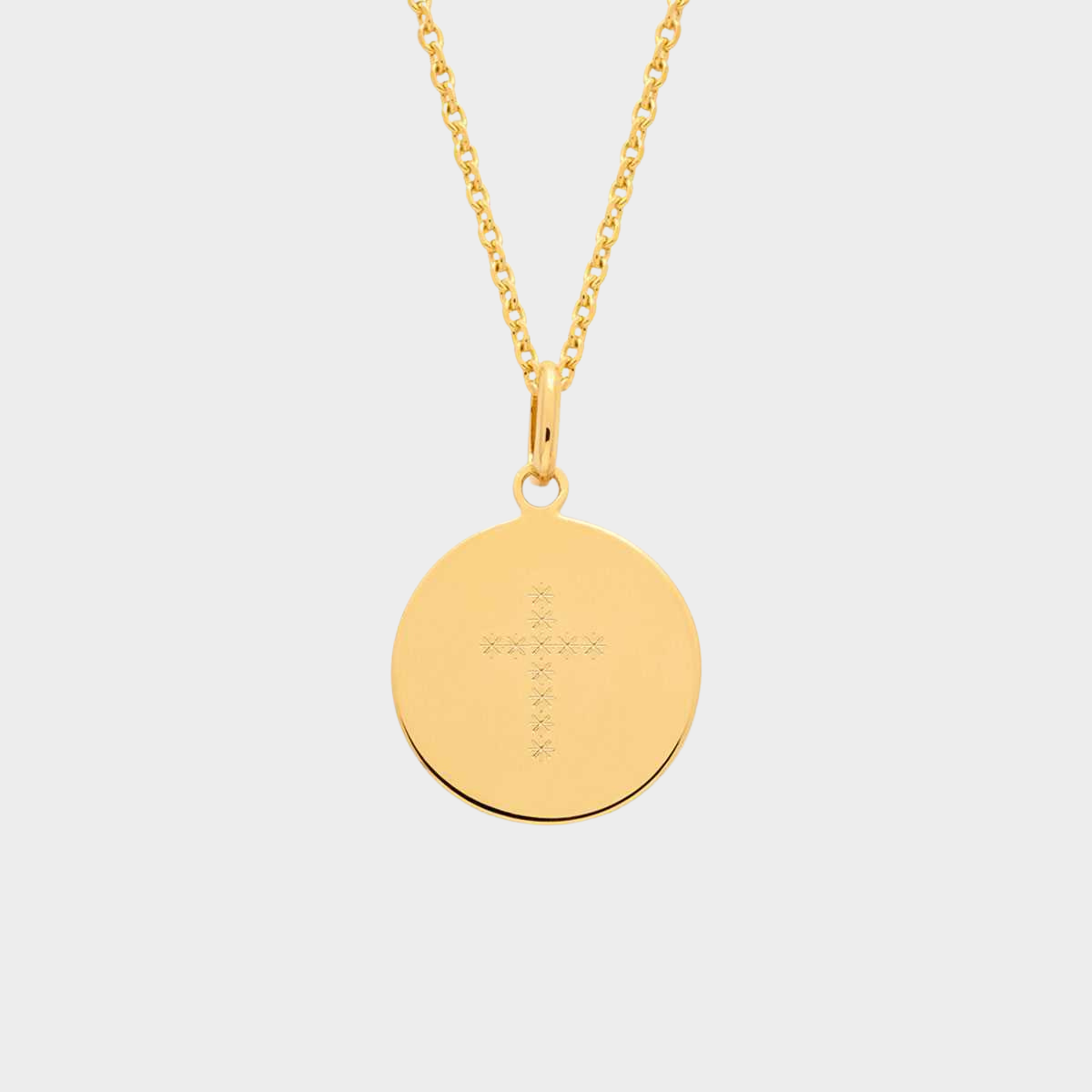 Collier petite médaille croix plaqué or gravure étoilée