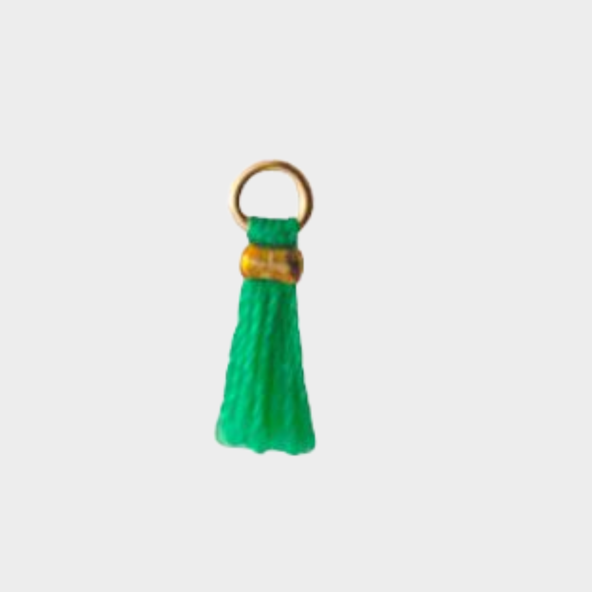 Mini pompon plaqué or vert