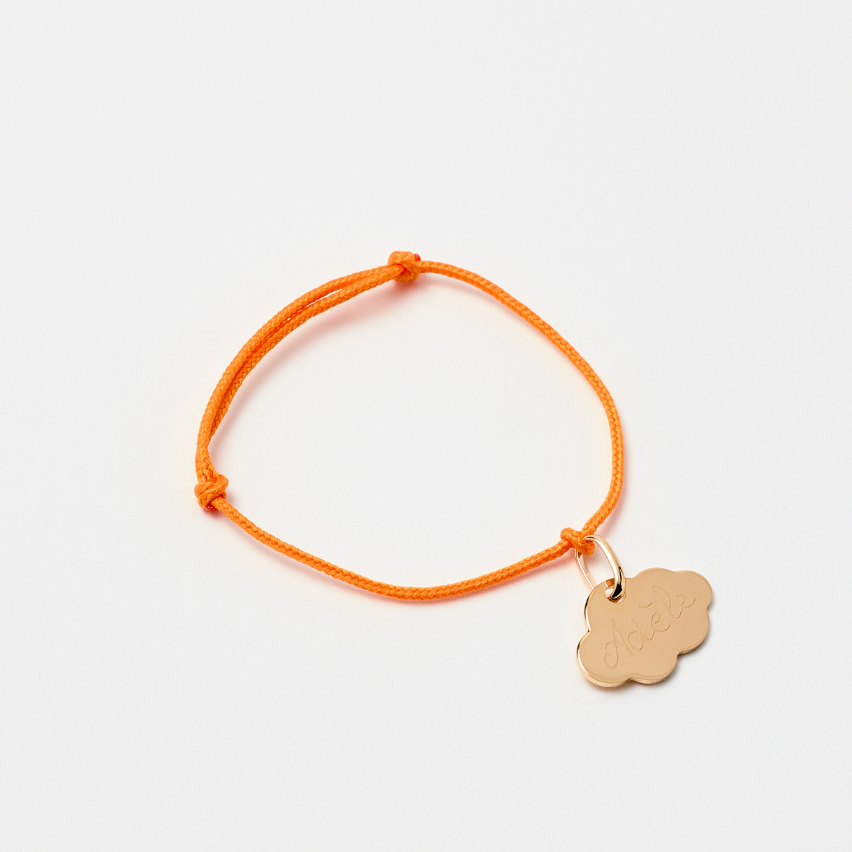 Bracelet petit nuage sur lien coton plaqué or