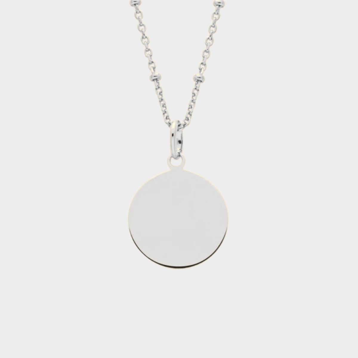 Pendentif médaille sur chaîne perlée argent