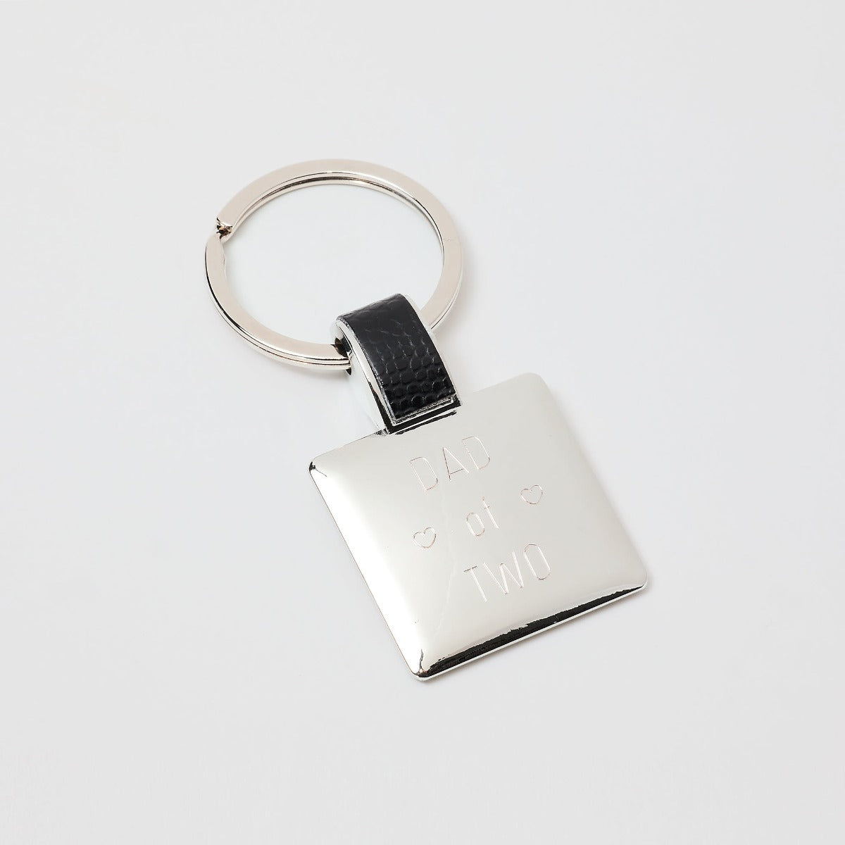 Porte clé acier et cuir carré Noir
