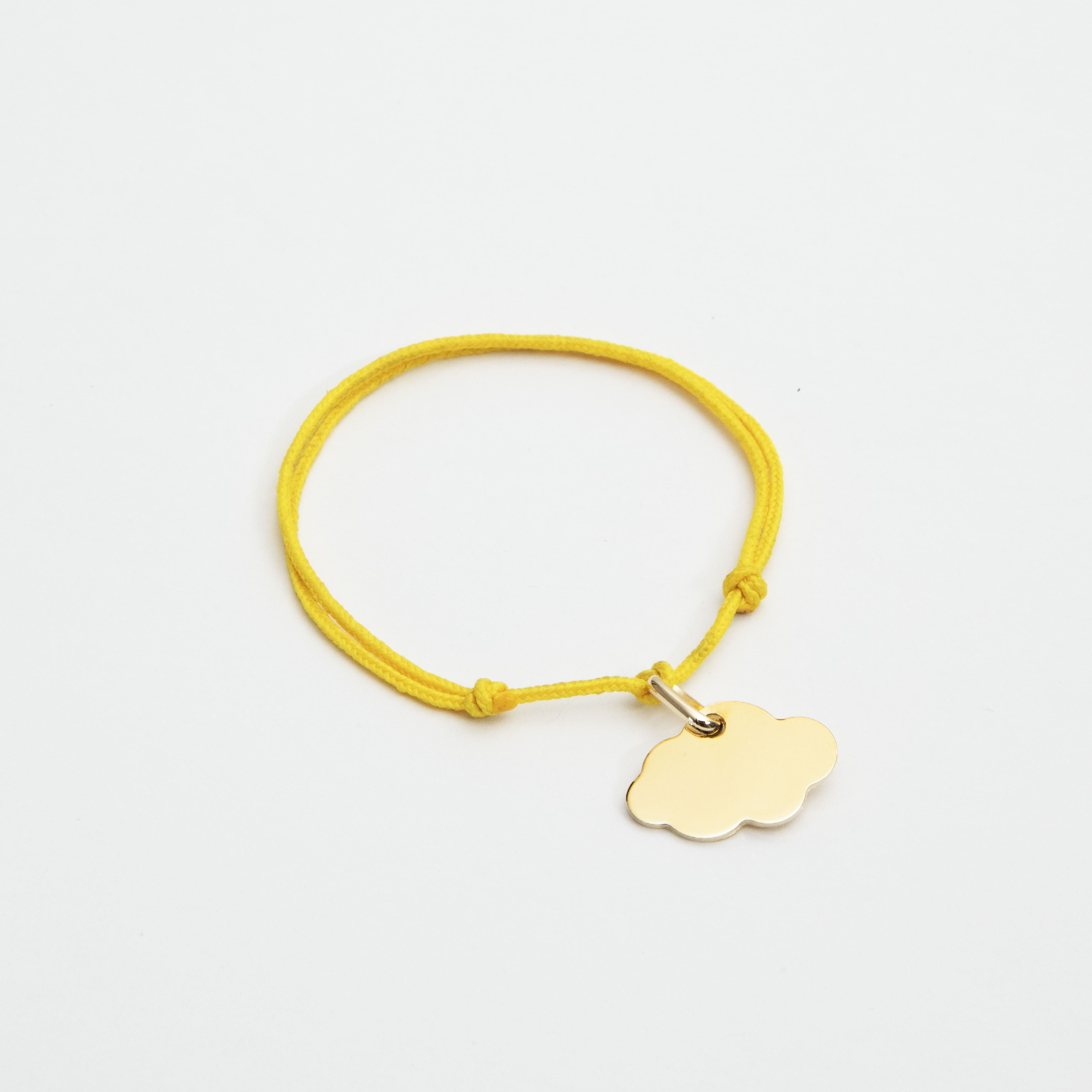Bracelet petit nuage sur double lien coton plaqué or
