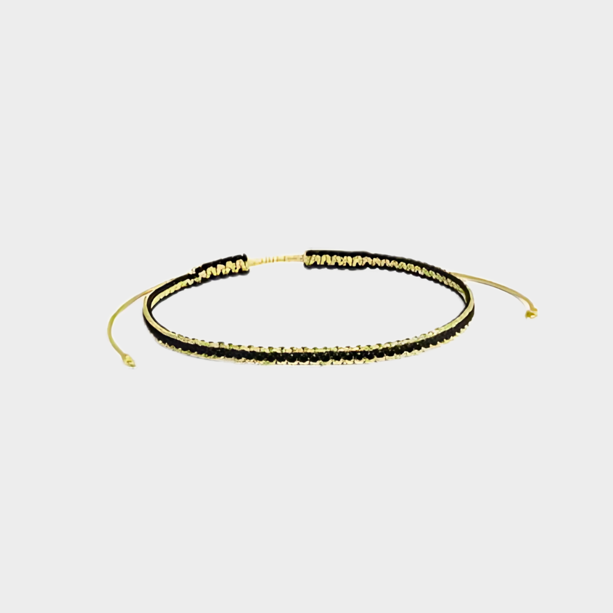 Bracelet tissé pailleté fil or et noir